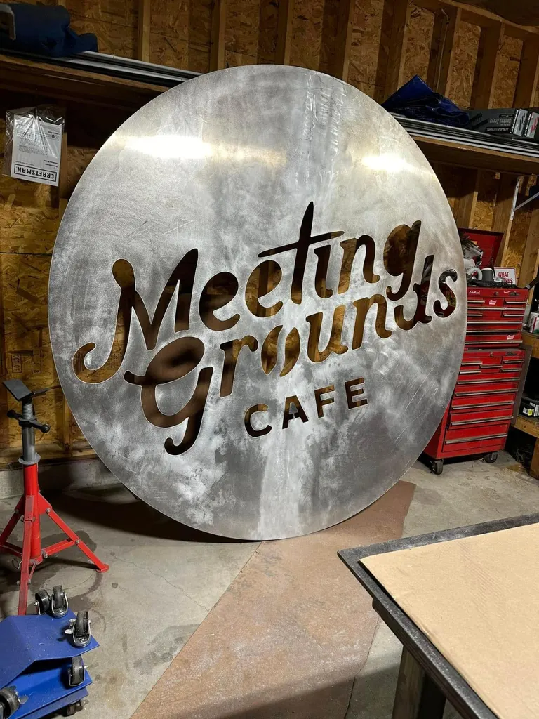 Custom metal sign fabricated for Meeting Grounds Cafe by McMahons
