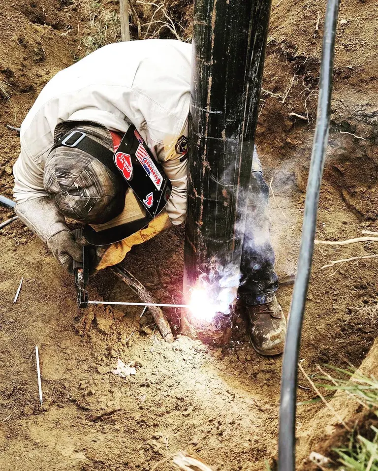 On-site pipe welding in the field by McMahons Welding Services